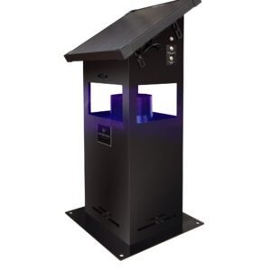 The GOKDA X4 outdoor mosquito trap device, featuring an angled roof and a purple internal light, set in a wide grassy field under a dramatic starry night sky with the Milky Way visible.