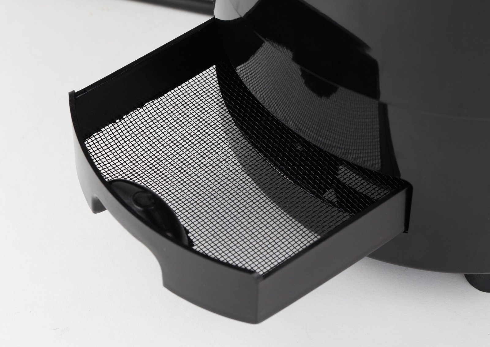 Close-up view of the fine black mesh insect catch net installed in the black housing of the W-B series mosquito control lamp, designed for easy removal and cleaning.